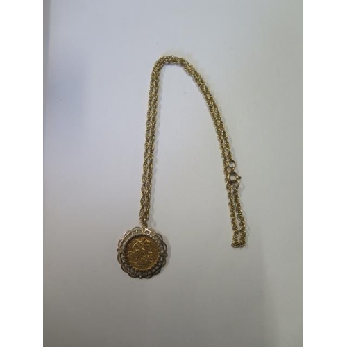 763 - Edward VII gold half sovereign on a gilt metal chain, total approx 13.2 grams