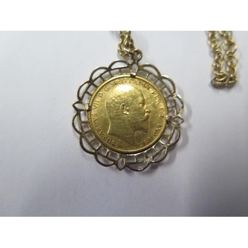 763 - Edward VII gold half sovereign on a gilt metal chain, total approx 13.2 grams