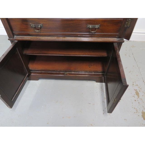 80 - An Edwardian mahogany Wellington chest cabinet with 5 drawer above 2 cupboard doors with key, 109cm ... 