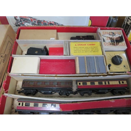 801 - Two box Trix train sets, assorted rolling stock and boxed track