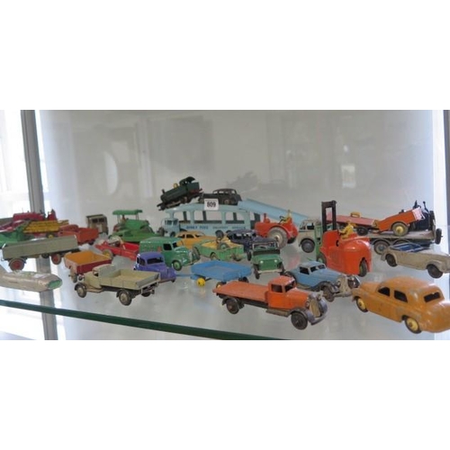 809 - A collection of approximately 40 diecast Dinky and other vehicles, all play worn, but original paint... 