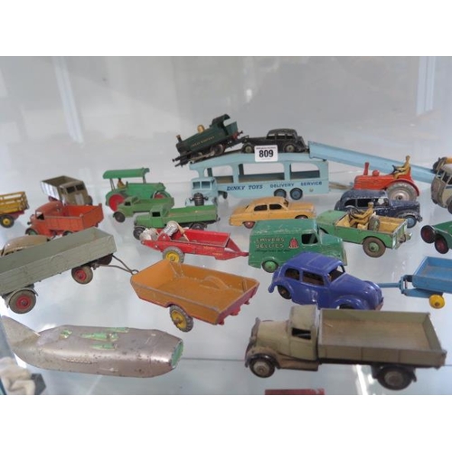 809 - A collection of approximately 40 diecast Dinky and other vehicles, all play worn, but original paint... 