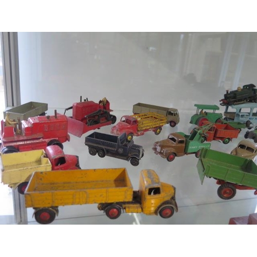 809 - A collection of approximately 40 diecast Dinky and other vehicles, all play worn, but original paint... 