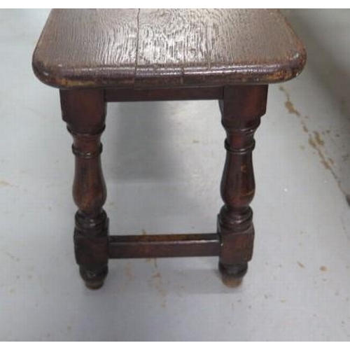 82 - A pair of Victorian oak  benches, apparently from a Cambridge Court ,51cm tall x 27cm wide x 213cm l... 