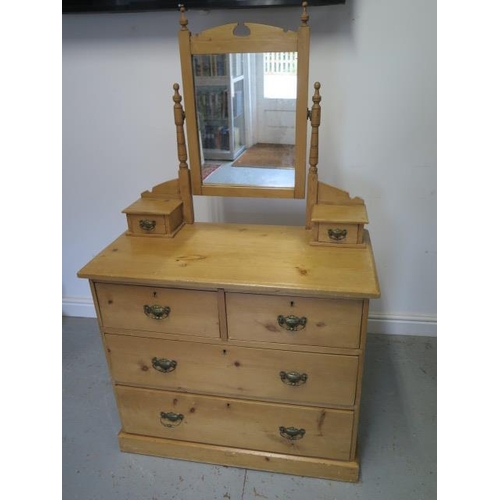 84 - A late Victorian stripped pine 4 drawer dressing chest with 2 small trinket drawers, 152cm tall x 90... 