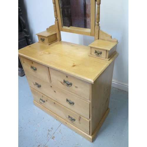 84 - A late Victorian stripped pine 4 drawer dressing chest with 2 small trinket drawers, 152cm tall x 90... 