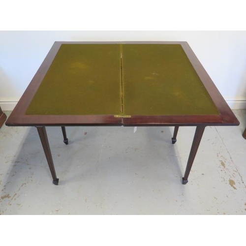 85 - An Edwardian side / card table with 2 frieze drawers faced with blind fretwork brass knob handles, t... 