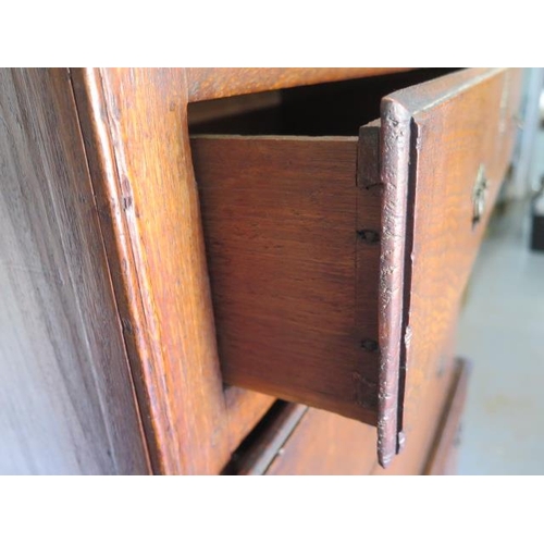 106 - An 18th century and later oak 5 drawer chest on a 3 drawer stand, 160cm tall x 97cm x 51cm