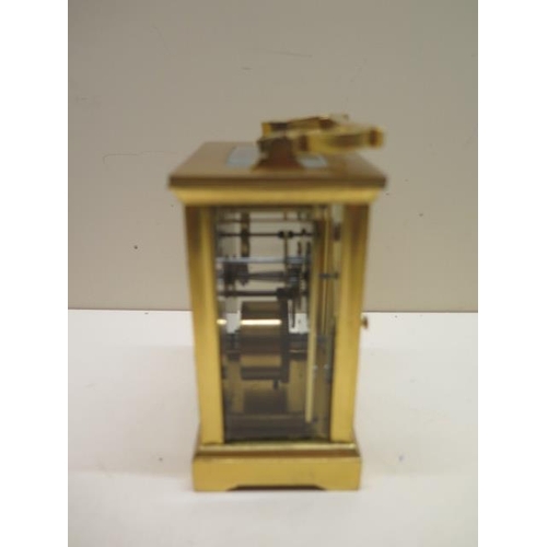 155 - A brass French 8 day carriage clock, 13cm tall, glass good, running with key