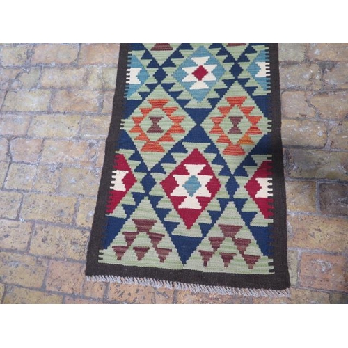 181 - A hand knotted woollen Maimana Kilim runner, 196cm x 65cm