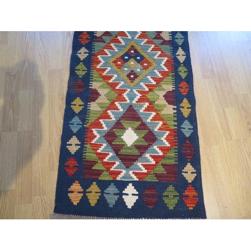 184 - A hand knotted woollen Chobi Kilim runner, 197cm x 58cm