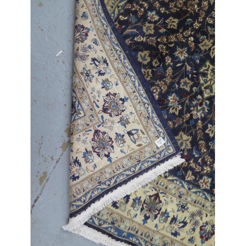 198 - A hand knotted woollen fine Nain, silk inlaid rug, 2.15cm x 1.65cm, generally good