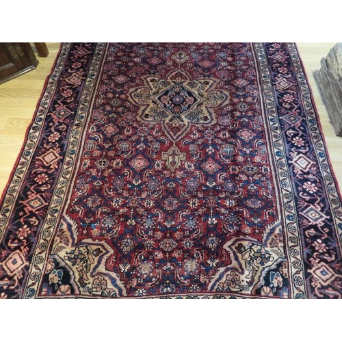 200 - A hand knotted woollen Fien Bijar rug, 2.05m x 1.30m, in good condition