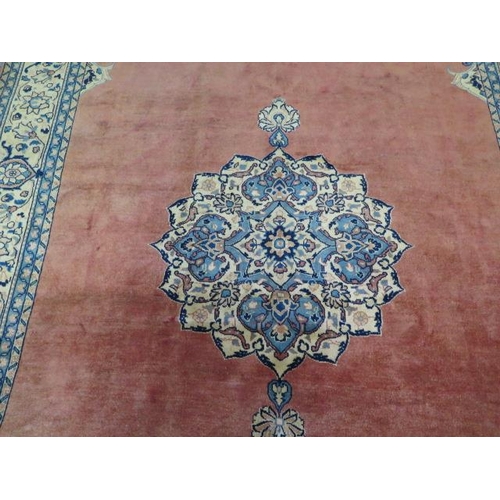 203 - A hand knotted woollen Tabriz rug, 2.95cm x 1.97cm, generally good