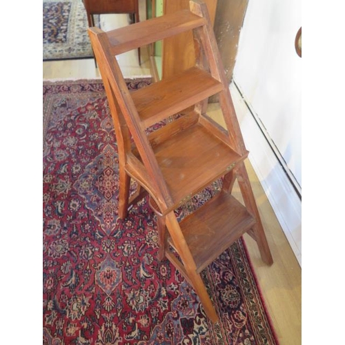 27 - A modern hardwood metamorphic library chair / steps