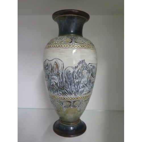 282 - A Royal Doulton Hannah Barlow sgraffito vase decorated with cattle and horses, 30cm tall, restoratio... 