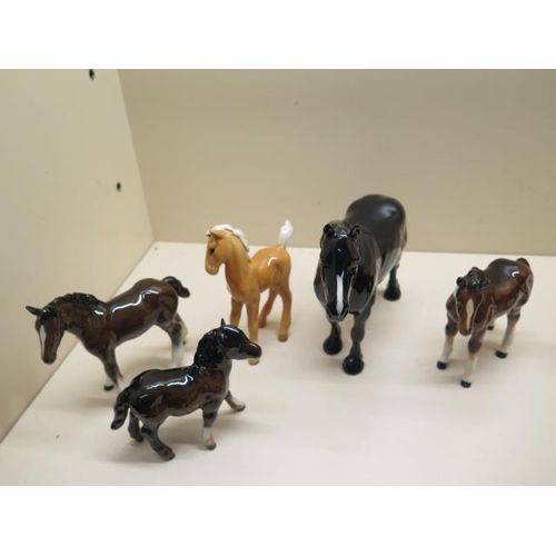 327 - A collection of 13 Beswick horses, foals, ponies, donkeys and a dog, all good