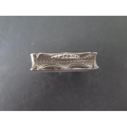 425 - A silver vinaigrette, Birmingham Nathaniel Mills 1842/43, 3.5cm wide, generally good small dent to t... 