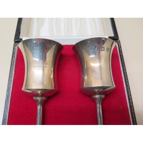 429 - A boxed pair of silver water goblets, approx 4.5 troy oz, 11cm tall, in good condition