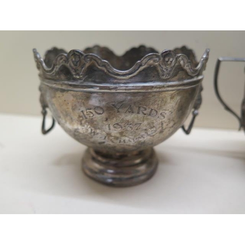 430 - A silver sugar bowl, a silver trophy cup, 8cm tall and an Eastern silver posy bowl, total weight app... 