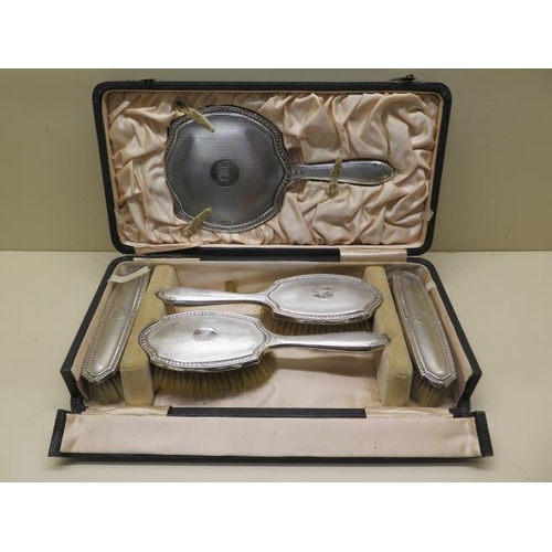 435 - A boxed silver backed 5 piece dressing table set (no comb) Chester 1921/22, 1922/23 Robert Pringle a... 