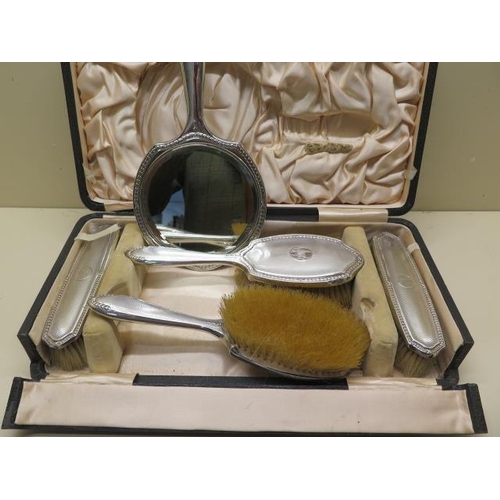 435 - A boxed silver backed 5 piece dressing table set (no comb) Chester 1921/22, 1922/23 Robert Pringle a... 