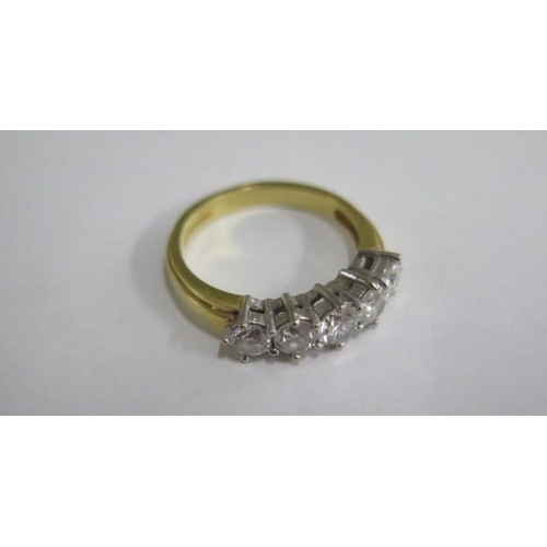 461 - An 18ct yellow gold hallmarked 5 stone diamond ring, centre stone approx 0.30ct, size Q/R, diamonds ... 