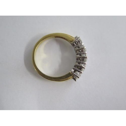 461 - An 18ct yellow gold hallmarked 5 stone diamond ring, centre stone approx 0.30ct, size Q/R, diamonds ... 