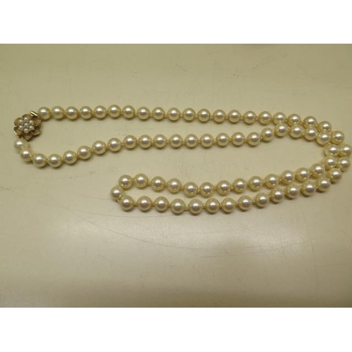 469 - A string of Ciro pearls with a 9ct clasp, 73cm long, pearls approx 7mm