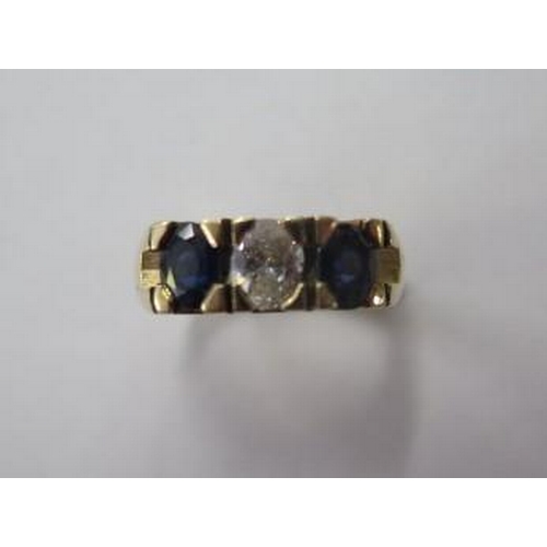 477 - A 14ct yellow gold three stone diamond and sapphire ring, the centre diamond approx 2.5ct, size L, a... 