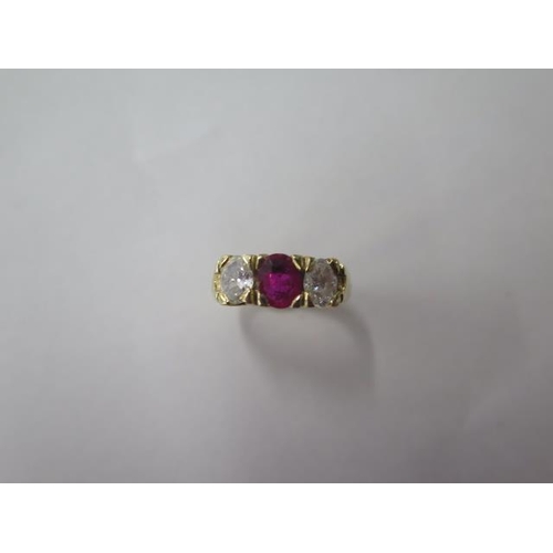 478 - A yellow gold three stone ruby and diamond ring, each stone approx 0.25ct, diamonds bright and livel... 