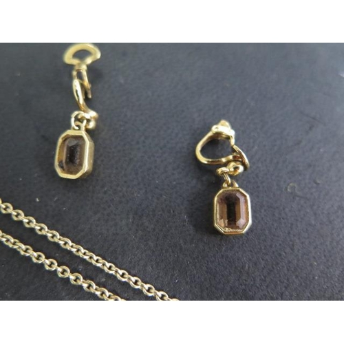 488 - A 9ct gold 42cm chain with a gilt pendant, a pair of similar gilt earrings, approx 9 grams, 2 x 9ct ... 