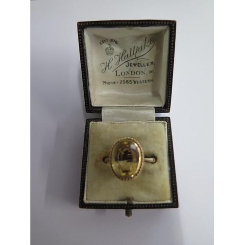 499 - A 9ct yellow gold citrine ring, size N, approx 3.6 grams, in generally good condition