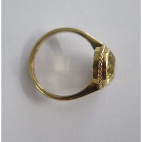 499 - A 9ct yellow gold citrine ring, size N, approx 3.6 grams, in generally good condition