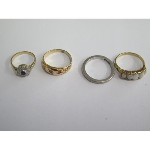 500 - 3 x unhallmarked yellow gold rings, sizes G to N, approx 8.8 grams, and a platinum band ring, size N... 