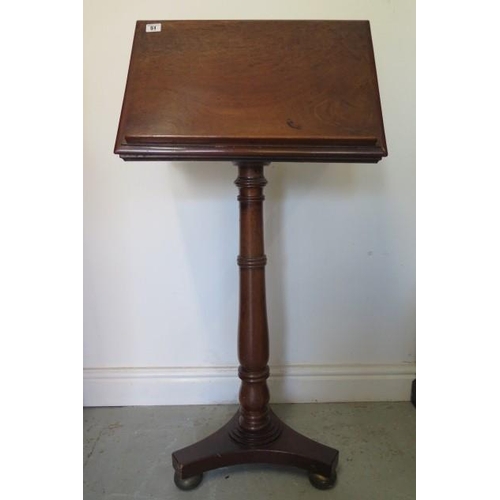 51 - A Victorian mahogany folding top music / reading stand on a turned column and tripartite base, 79cm ... 