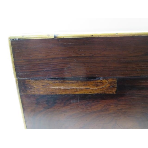 54 - A Victorian brass bound rosewood travel jewellery box with a fitted interior and fitted base drawer ... 