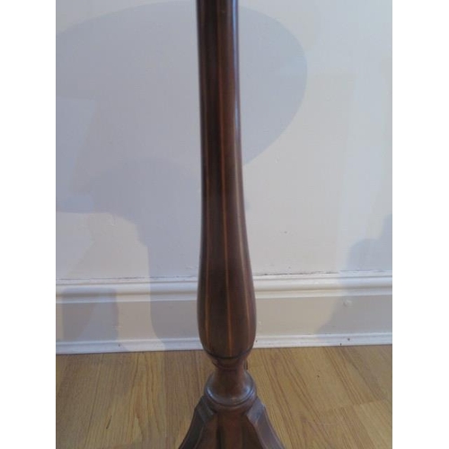 55 - A pretty inlaid mahogany side / wine table on a turned column and tripod base, 70cm tall x 45cm diam... 