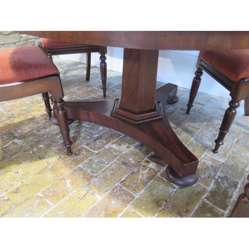 72 - A 19th century breakfast mahogany table with 4 chairs, the table of circular form on central column ... 