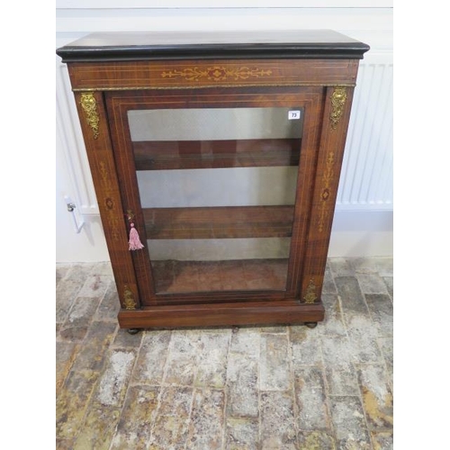 73 - A Victorian walnut ormulu mounted single door pier cabinet, 100cm tall x 75cm x 31cm, with a key in ... 