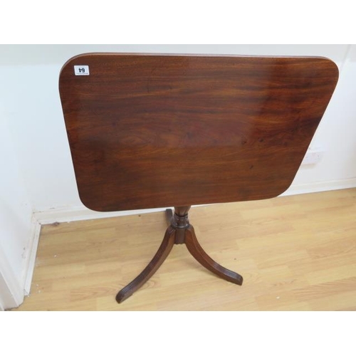79 - A 19th century mahogany tilt top table on a turned column and splayed tripod base, 70cm tall x 54cm ... 