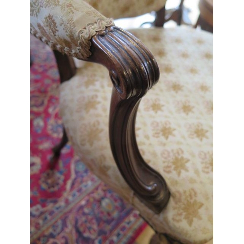 93 - An 18th century and later mahogany upholstered elbow chair with horse hair filling, some old repairs... 