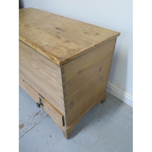 53 - A Georgian stripped pine two drawer mule chest with an interesting papered interior and secret drawe... 