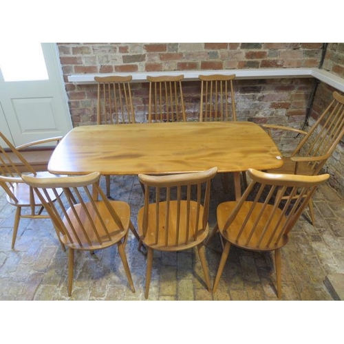 1 - A blonde elm Ercol dining table, 71cm tall x 152cm x 75cm with separate extension which extends it t... 