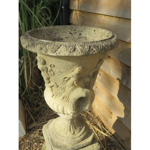12 - A classical stone effect garden urn on stand, 95cm tall x 40cm diameter