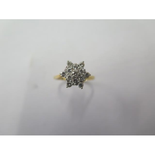 A hallmarked 18ct yellow gold diamond cluster ring, size Q, approx 3 grams , some but generally good