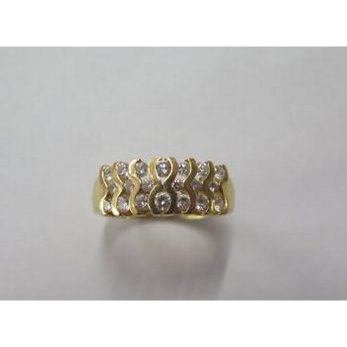 An 850 yellow gold diamond ring, size K, approx 5 grams, signs of re-sizing but diamonds bright and good condition