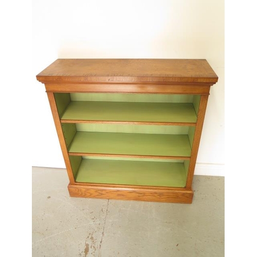 104 - A new burr oak bookcase with two adjustable shelves and painted interior, made by a local craftsman ... 