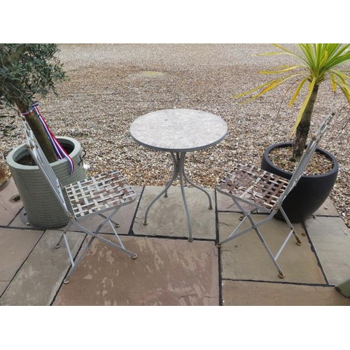 14 - A French cafe style metal table and folding chair set, table 72cm tall x 60cm, weathered condition