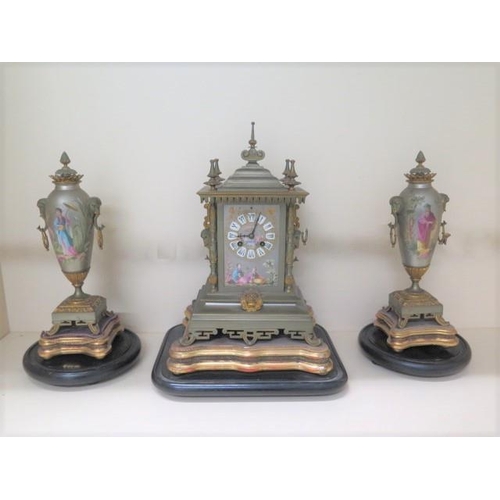 150 - A good 19th century French silvered and gilt metal chinoiserie decorated clock garniture set with a ... 